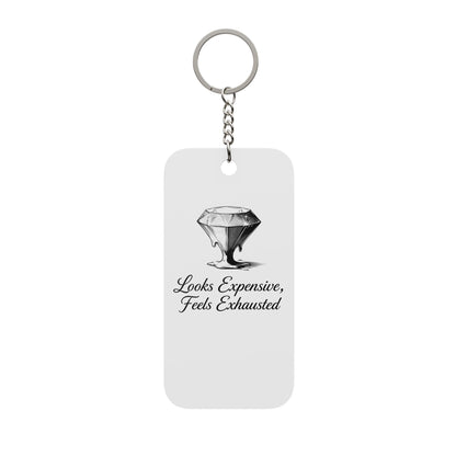 Keychain — “Looks Expensive, Feels Exhausted” Double-Sided Charm