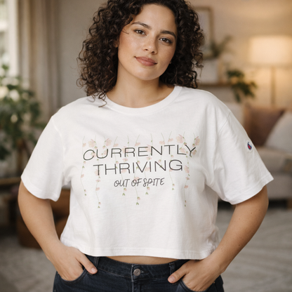 Champion Women's Cropped T-Shirt — "Thriving Out of Spite" Sarcastic Graphic Tee