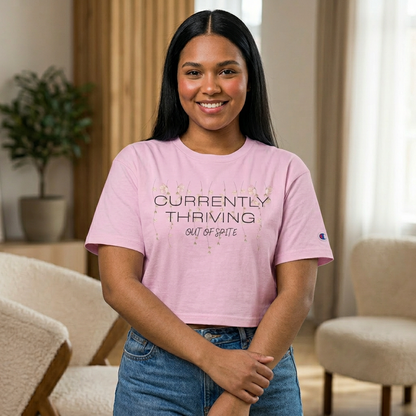 Champion Women's Cropped T-Shirt — "Thriving Out of Spite" Sarcastic Graphic Tee