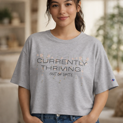 Champion Women's Cropped T-Shirt — "Thriving Out of Spite" Sarcastic Graphic Tee